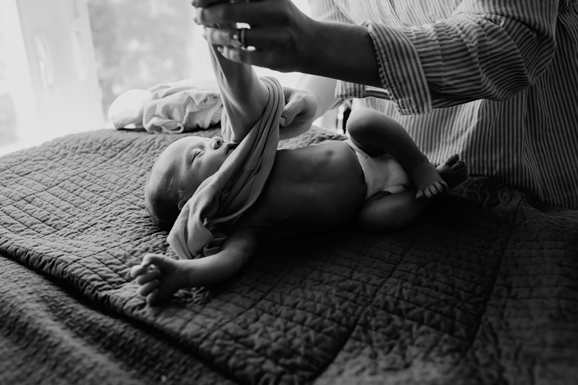 documentary, newborn lifestyle photography, black and white, Beth Ann Fricker, changing baby