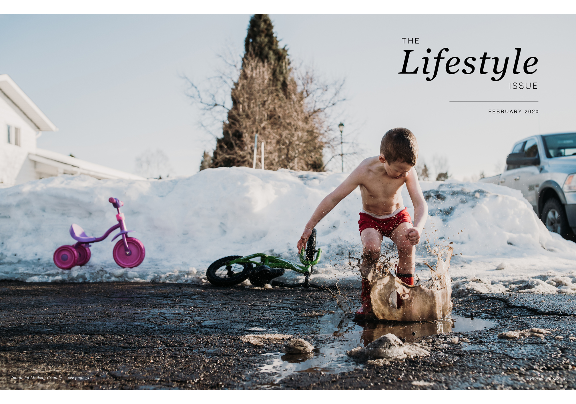 The Lifestyle Issue, February 2020, boy jumping in mud, snow pile, truck, tricycle, bike