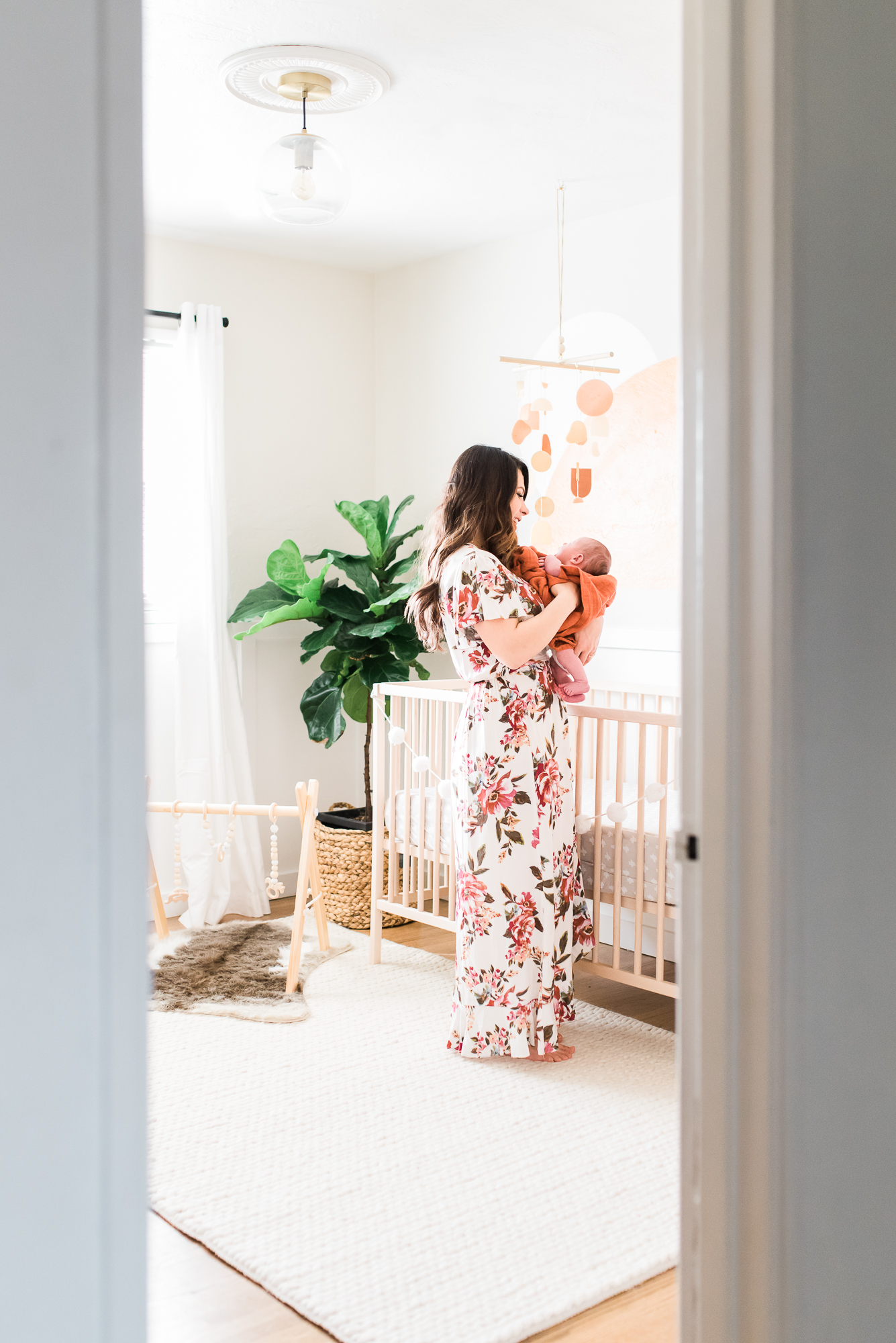 southwest theme nursery, nursery decor, mom and baby in nursery, newborn lifestyle photos